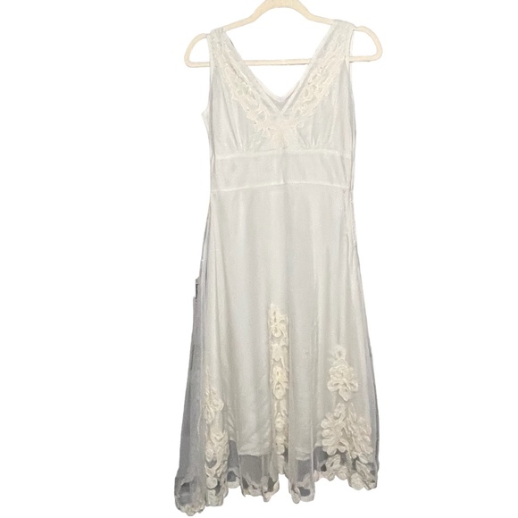 Cream Fairy core Mesh Lined Embroidered Asymmetrical Hem - Picture 1 of 6